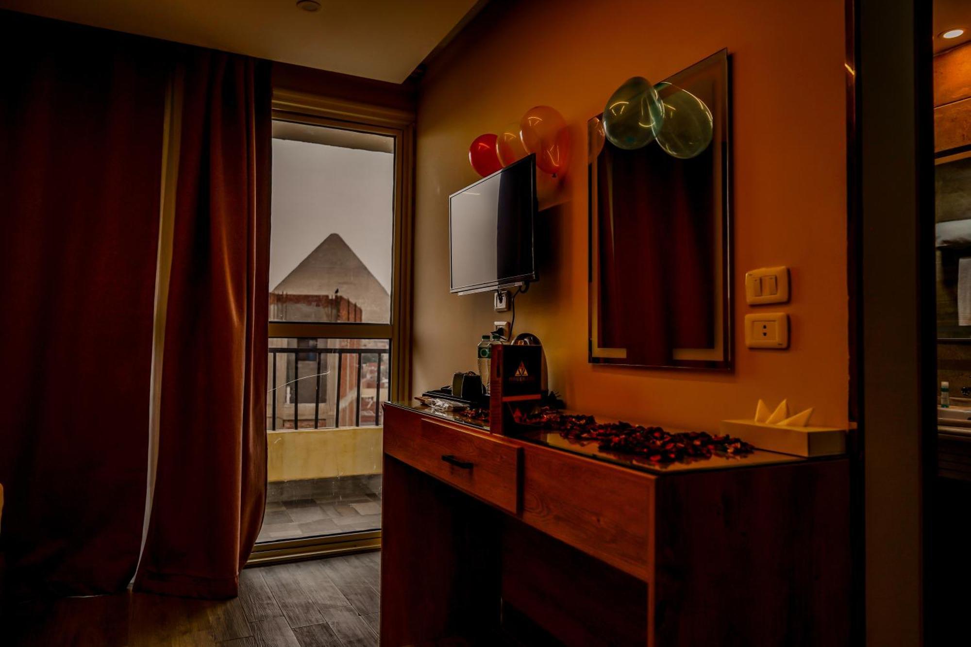 Pyramids Hotel Kafret el-Gabal Extérieur photo