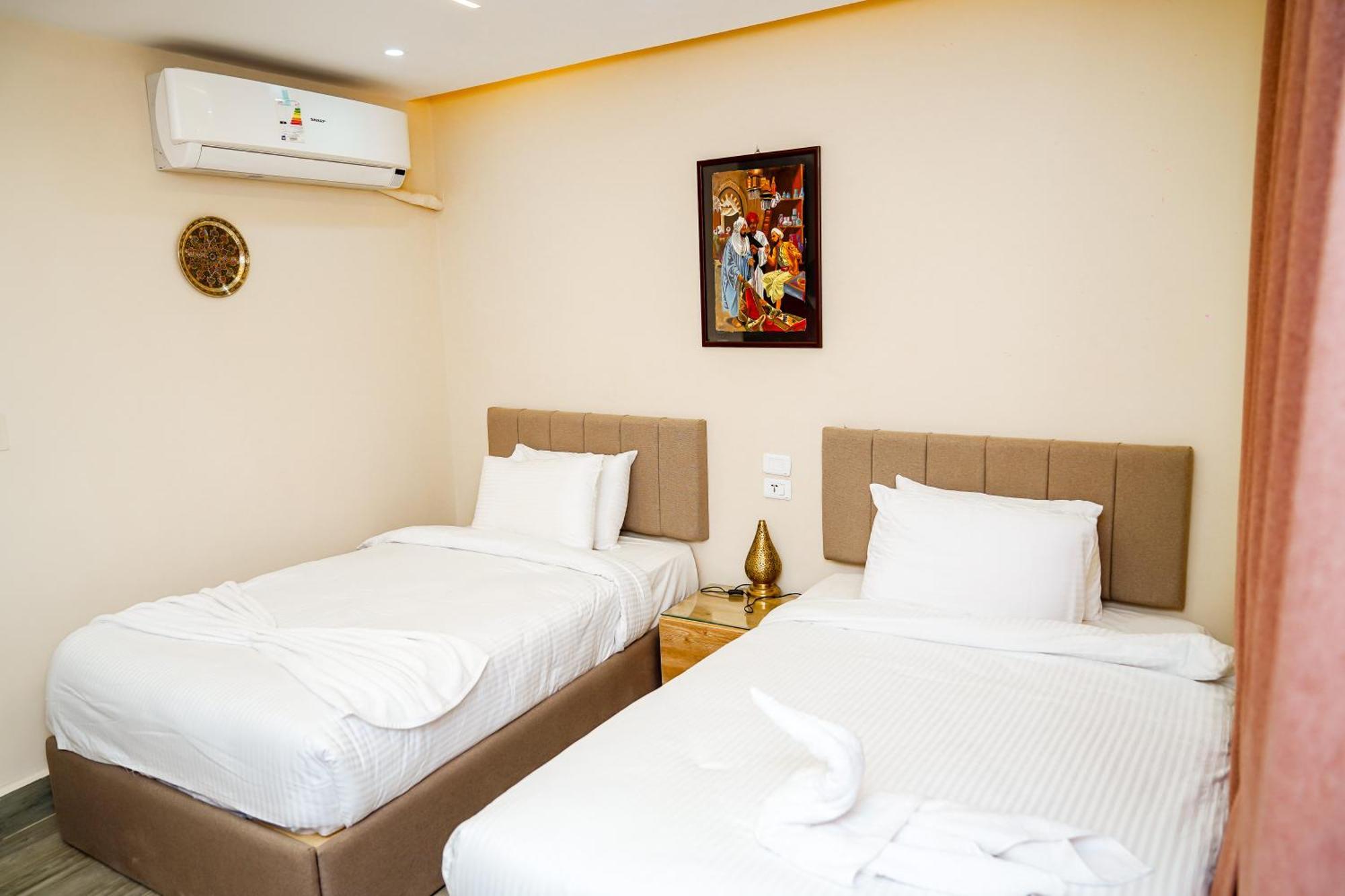 Pyramids Hotel Kafret el-Gabal Extérieur photo