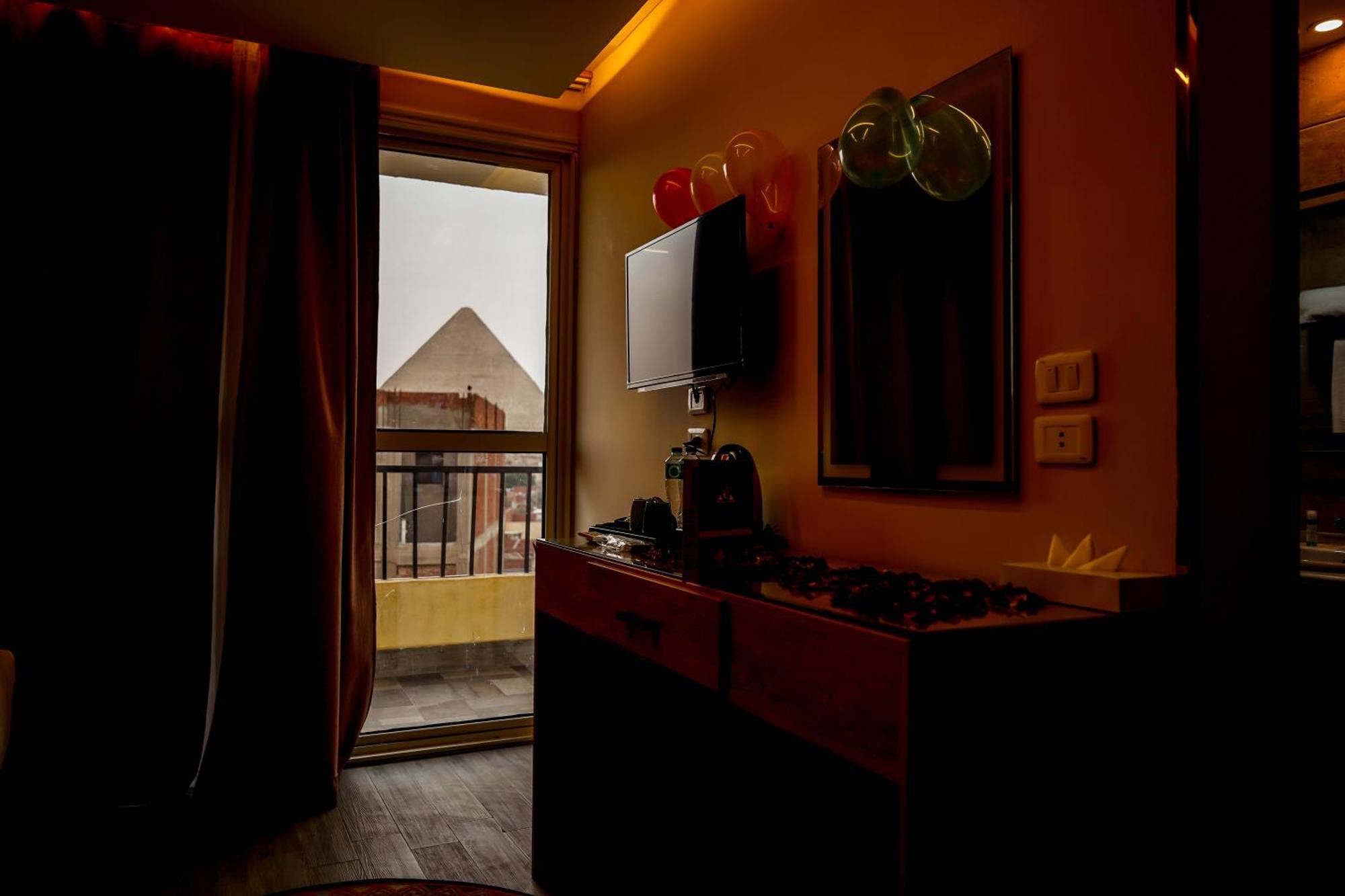 Pyramids Hotel Kafret el-Gabal Extérieur photo
